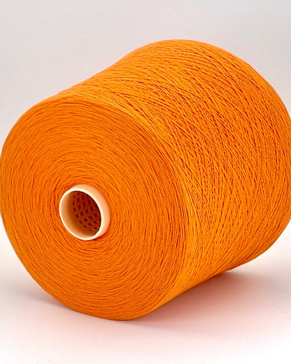 Todd & Duncan 100% Cashmere yarn (2/28 Nm) in a soft neutral palette. Shown as high-quality 2-ply lace weight thread on cones. Made in Scotland. Premium luxury yarn for retail at iDOKNiT.com.