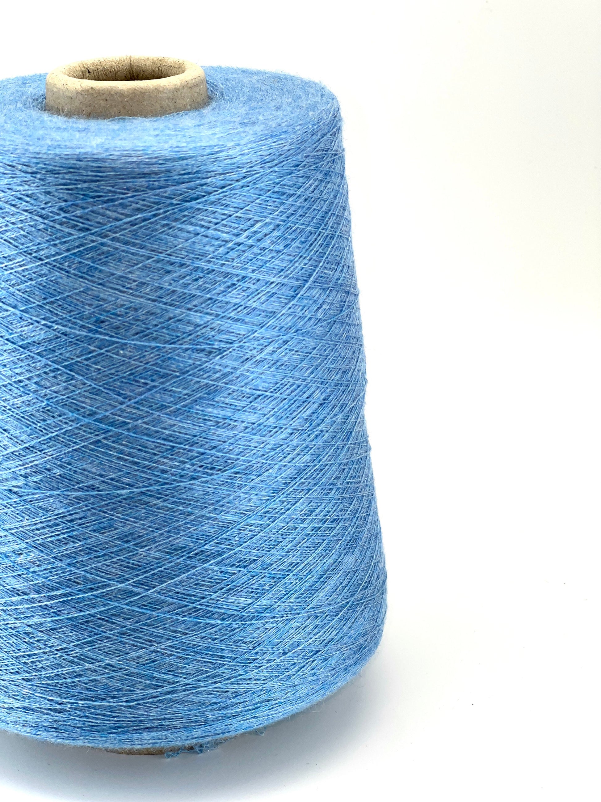 ROYAL 2/58 cashmere silk yarn luxury Italian lace yarn
70 cashmere 30 silk extra fine yarn 2900m per 100g
Luxury cashmere silk cone yarn for multi strand knitting and weaving
Light royal blue Italian yarn close up texture detail
ROYAL 2/58 lace yarn for couture knitting and blending