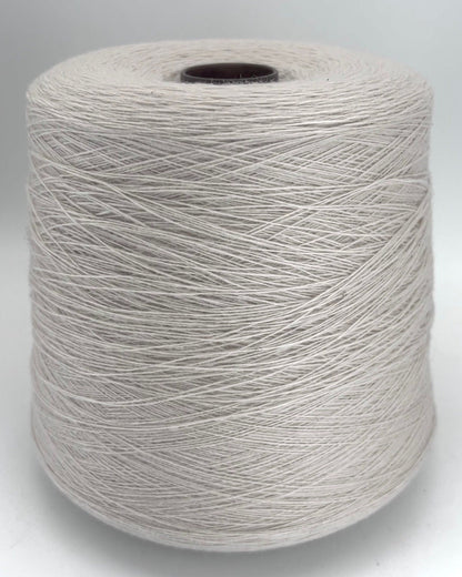 Spool of gray yarn on a white background