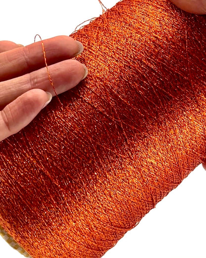 MISSONI DOMASO metallic lurex yarn cone in bright copper orange color, luxury Italian fashion-house yarn