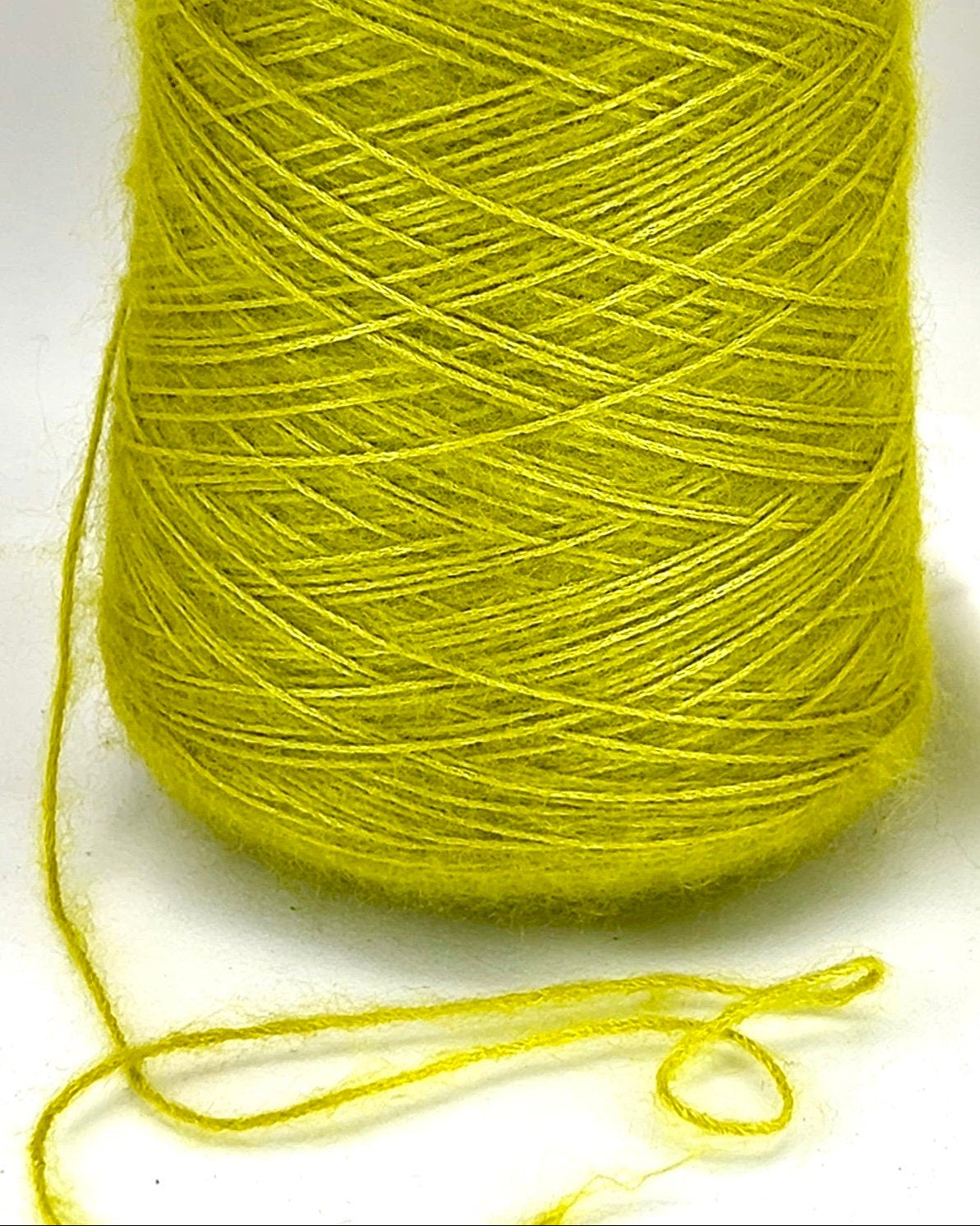 Silk and superkid mohair cord chain yarn on cone made in Italy by Filcom. Only at IDOKNIT shop.