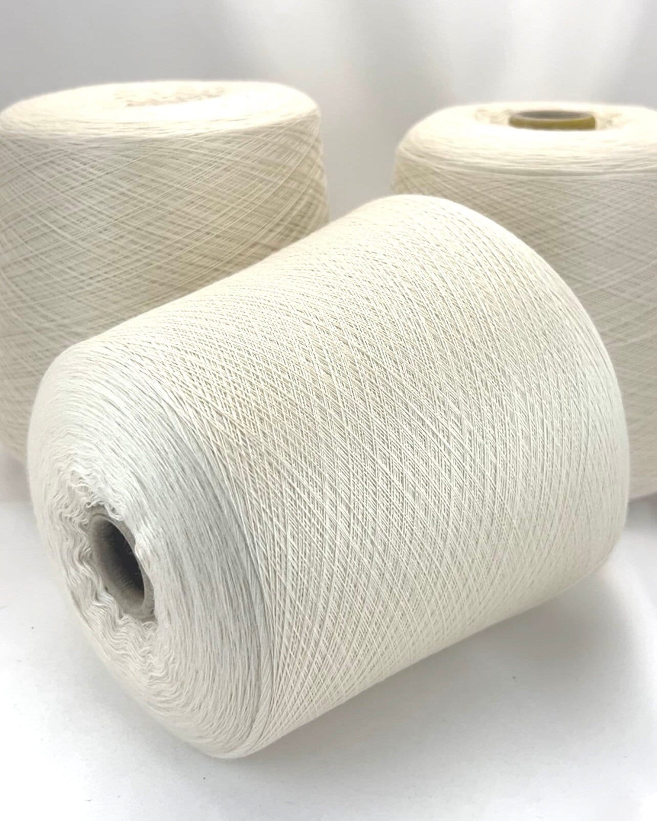 Luxury cashmere silk yarn CASH SETA from an exclusive Italian mill
Fine lace-weight cashmere silk yarn in off-white color
Italian cashmere silk cone yarn with exceptional meterage
Luxury knitting yarn for shawls, sweaters, and weaving
Cashmere silk lace yarn with elegant drape and softness