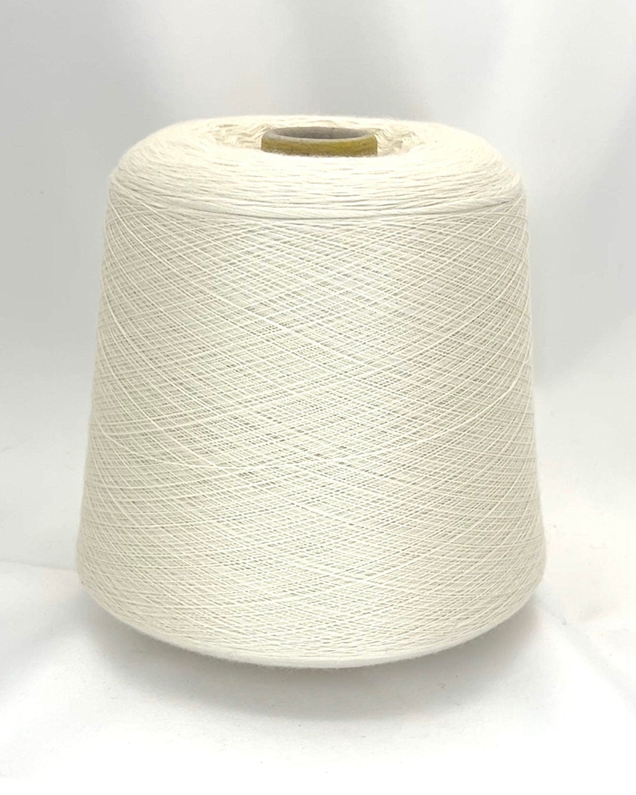 Luxury cashmere silk yarn CASH SETA from an exclusive Italian mill
Fine lace-weight cashmere silk yarn in off-white color
Italian cashmere silk cone yarn with exceptional meterage
Luxury knitting yarn for shawls, sweaters, and weaving
Cashmere silk lace yarn with elegant drape and softness