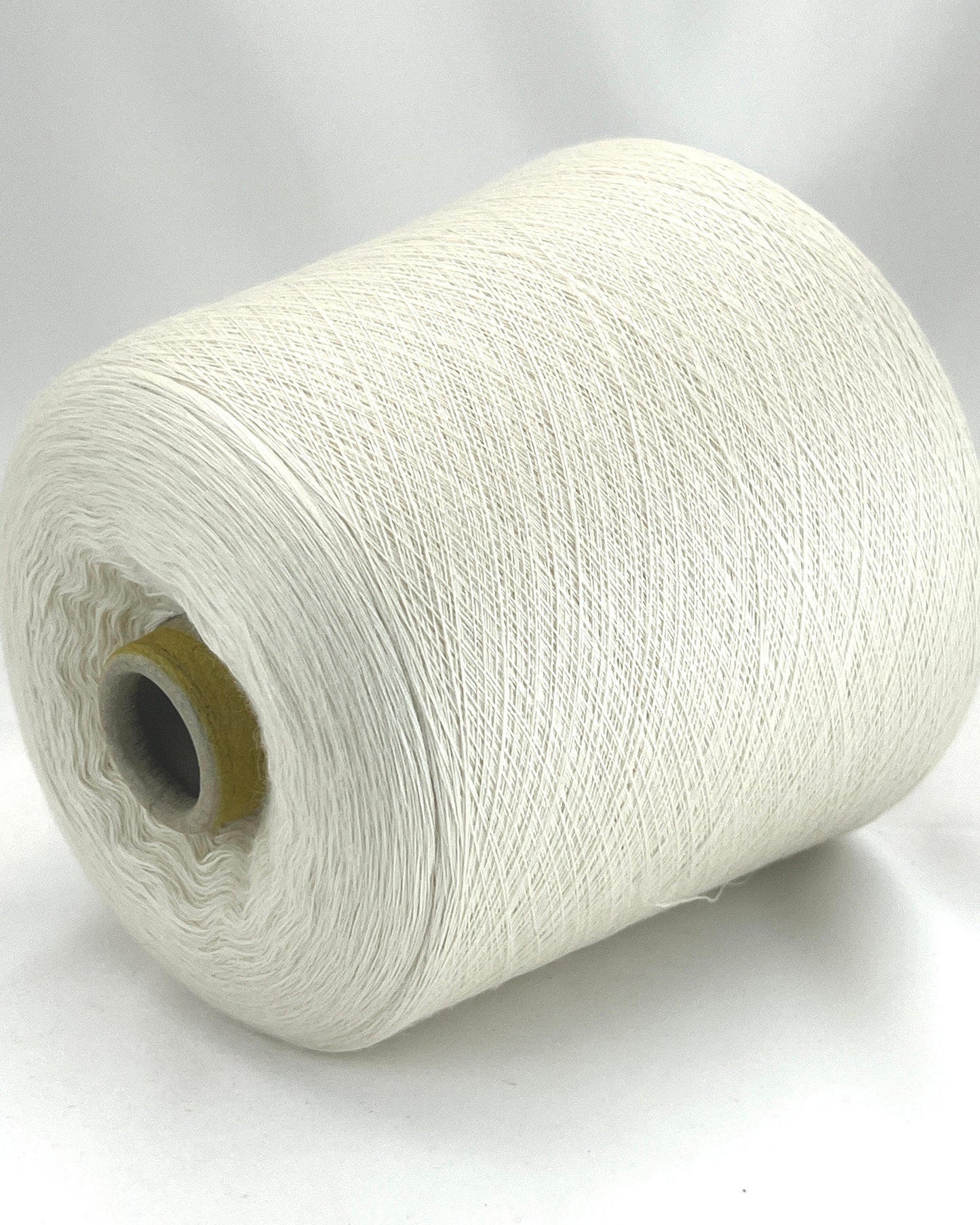 Luxury cashmere silk yarn CASH SETA from an exclusive Italian mill
Fine lace-weight cashmere silk yarn in off-white color
Italian cashmere silk cone yarn with exceptional meterage
Luxury knitting yarn for shawls, sweaters, and weaving
Cashmere silk lace yarn with elegant drape and softness