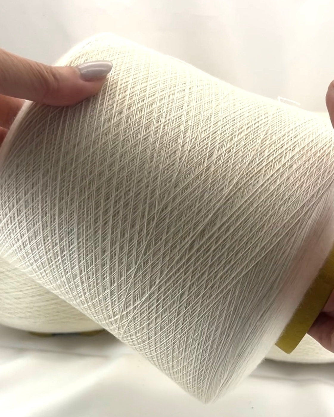 Luxury cashmere silk yarn CASH SETA from an exclusive Italian mill
Fine lace-weight cashmere silk yarn in off-white color
Italian cashmere silk cone yarn with exceptional meterage
Luxury knitting yarn for shawls, sweaters, and weaving
Cashmere silk lace yarn with elegant drape and softness