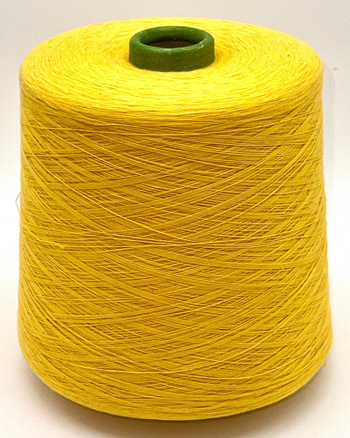 YUMA by Prisma Ricerche — sunflower yellow ecological lace-weight cable cotton yarn, shown on cone and in texture close-ups, available at iDOKNiT.