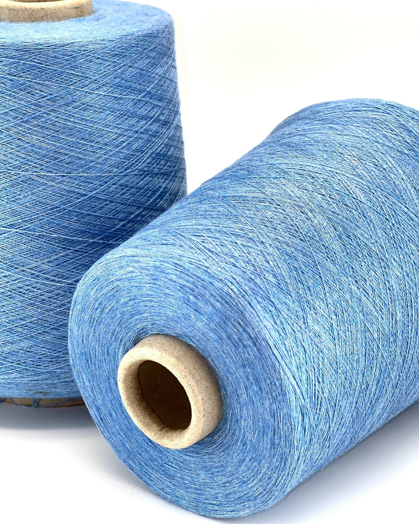 ROYAL 2/58 cashmere silk yarn luxury Italian lace yarn
70 cashmere 30 silk extra fine yarn 2900m per 100g
Luxury cashmere silk cone yarn for multi strand knitting and weaving
Light royal blue Italian yarn close up texture detail
ROYAL 2/58 lace yarn for couture knitting and blending