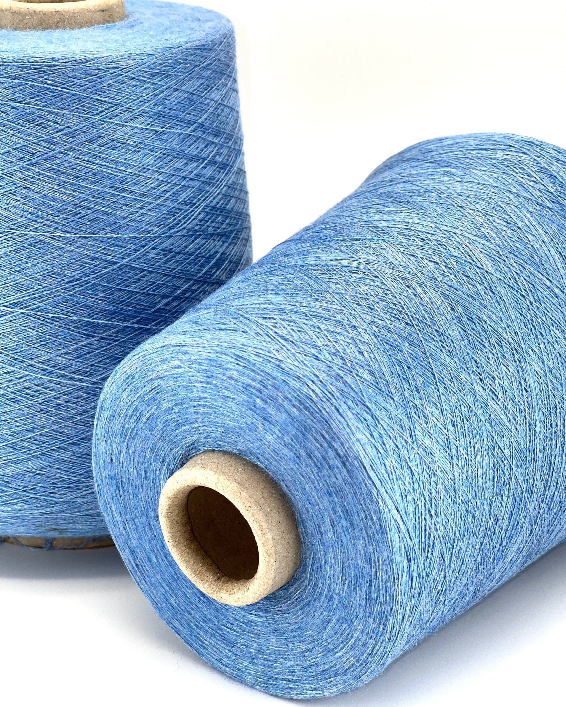 ROYAL 2/58 cashmere silk yarn luxury Italian lace yarn
70 cashmere 30 silk extra fine yarn 2900m per 100g
Luxury cashmere silk cone yarn for multi strand knitting and weaving
Light royal blue Italian yarn close up texture detail
ROYAL 2/58 lace yarn for couture knitting and blending