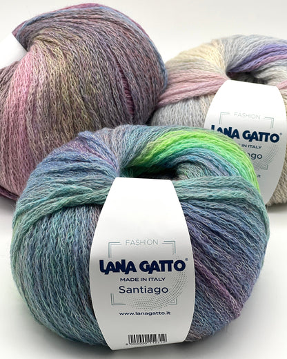 Three skeins of colorful yarn with 'Lana Gatto' labels on a white background