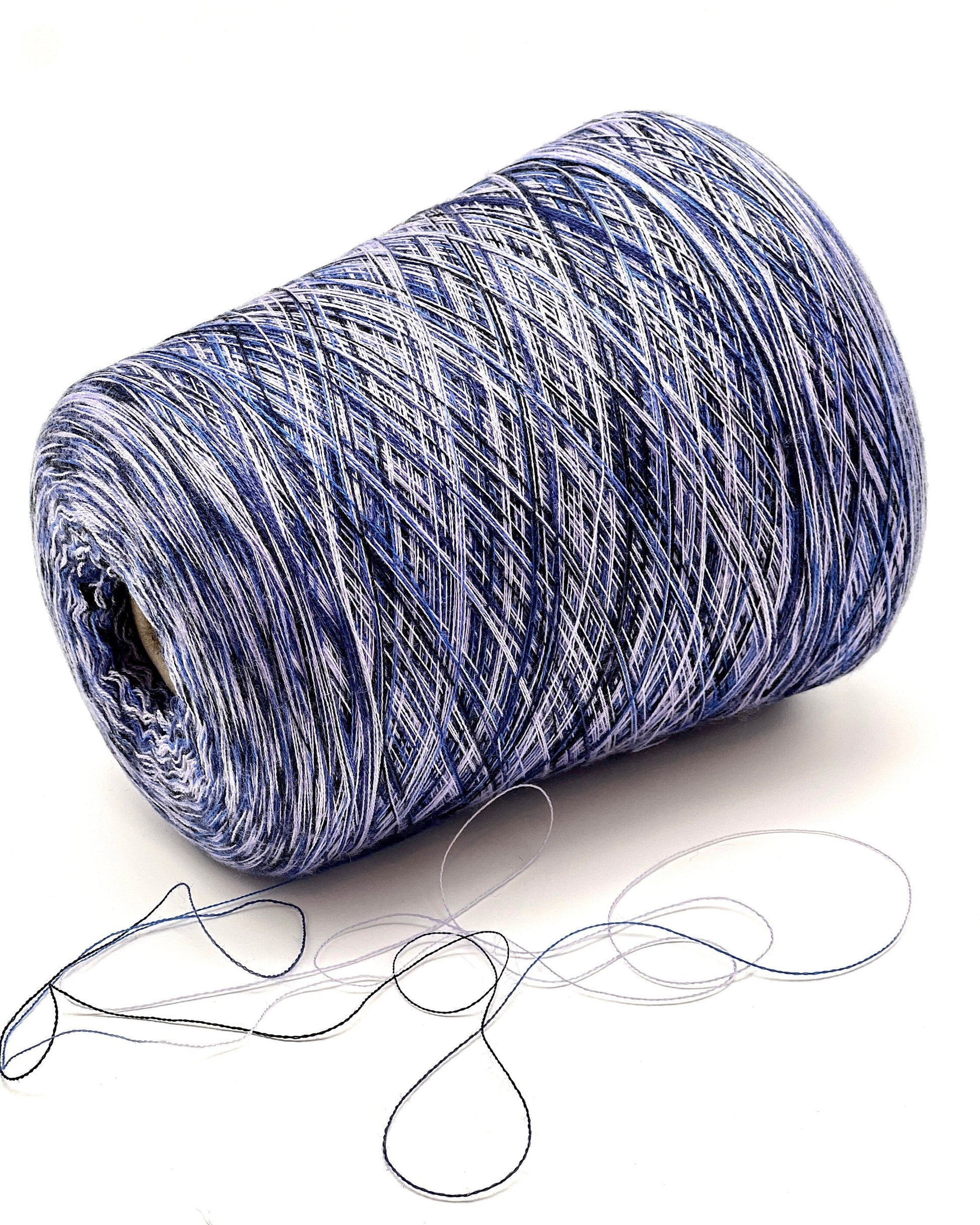 Rare MISSONI 100% Merino super fine yarn on cones. Features vibrant multicolor mixes like Violet Pink (806) and Green Orange (807). Premium Italian designer yarn available at iDOKNiT.com.