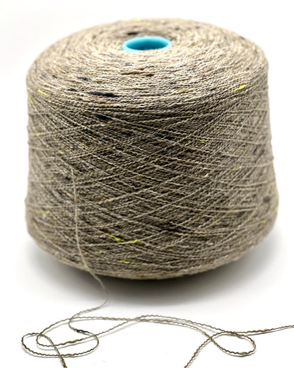 Spool of gray yarn on a white background