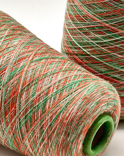 Rare MISSONI 100% Merino super fine yarn on cones. Features vibrant multicolor mixes like Violet Pink (806) and Green Orange (807). Premium Italian designer yarn available at iDOKNiT.com.