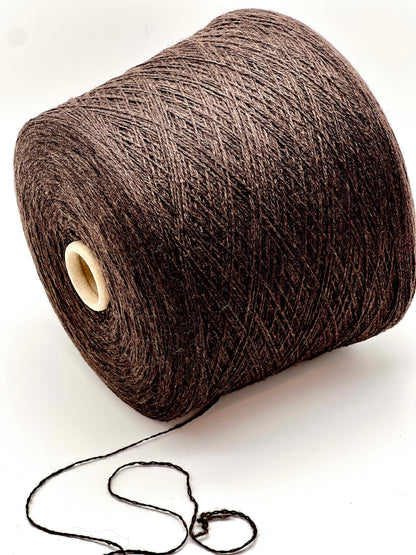 Brown yarn spool on a white background