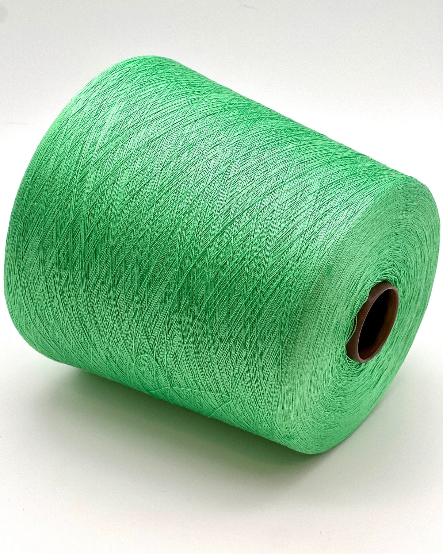 Botto Giuseppe Shine 100% pure Mulberry silk extra-fine lace weight yarn from iDOKNiT. Premium sustainable Italian-spun fiber with high natural luster for luxury knitting and weaving, 3000m per 100g cone.