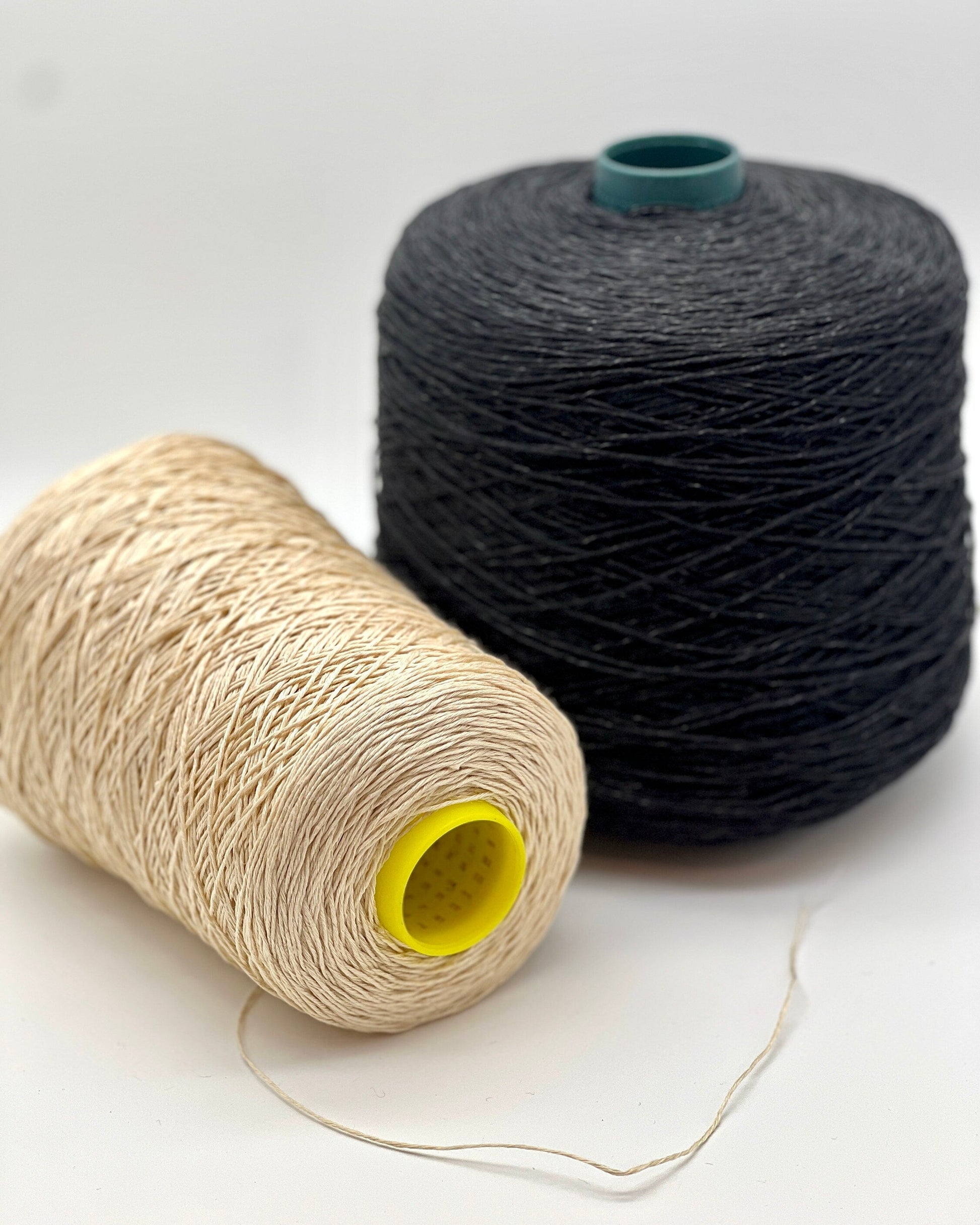 Exclusive iDOKNiT sport weight yarn, LINO by RI.Go Italy. 100% pure linen with an Nm 3200 count, providing 320m per 100g. Authentic Italian-made plant fiber curated by iDOKNiT in classic shades like 954 Black, 955 Beige, and 956 Navy Blue, ideal for durable, breathable summer hand or machine knitting.