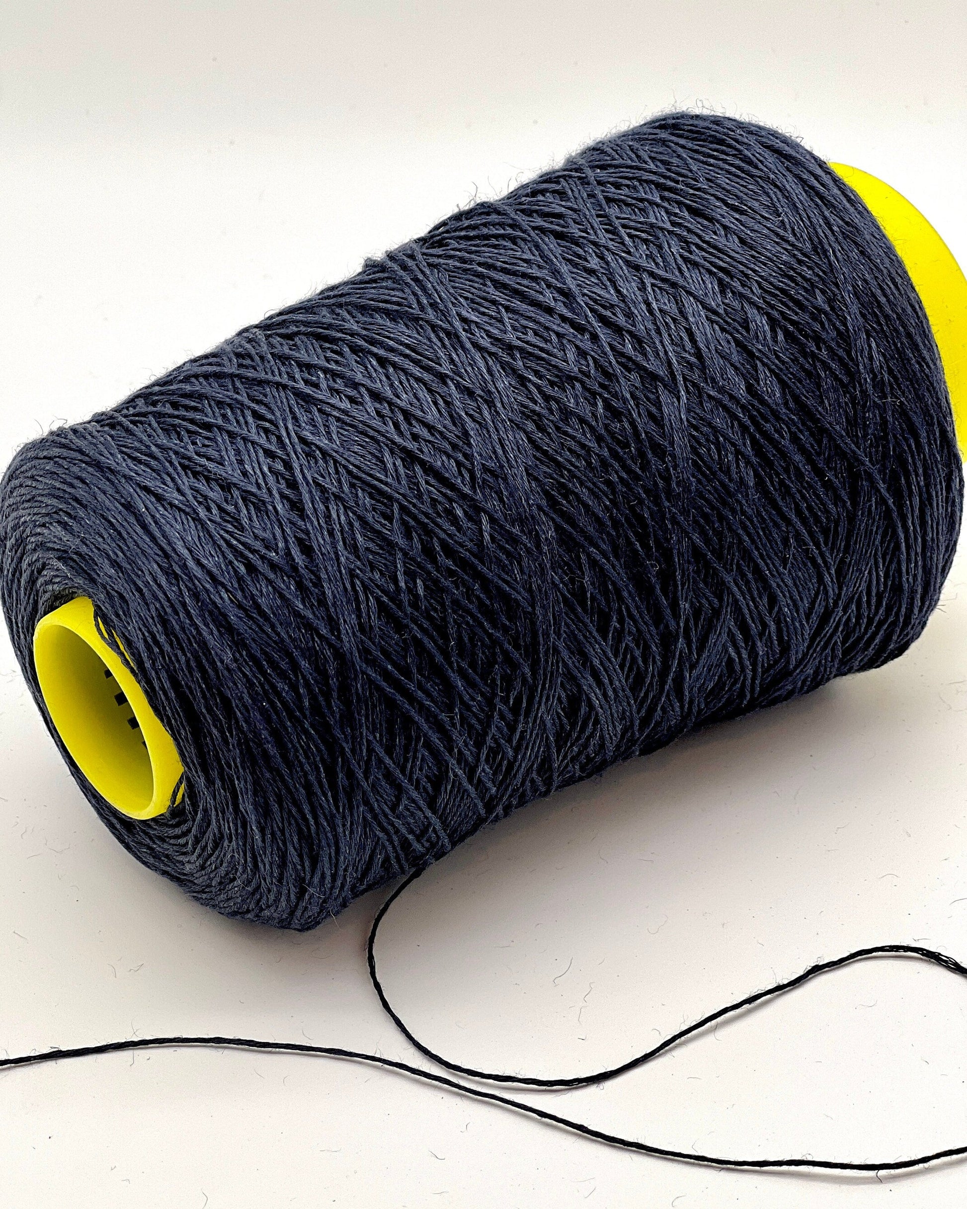 Exclusive iDOKNiT sport weight yarn, LINO by RI.Go Italy. 100% pure linen with an Nm 3200 count, providing 320m per 100g. Authentic Italian-made plant fiber curated by iDOKNiT in classic shades like 954 Black, 955 Beige, and 956 Navy Blue, ideal for durable, breathable summer hand or machine knitting.