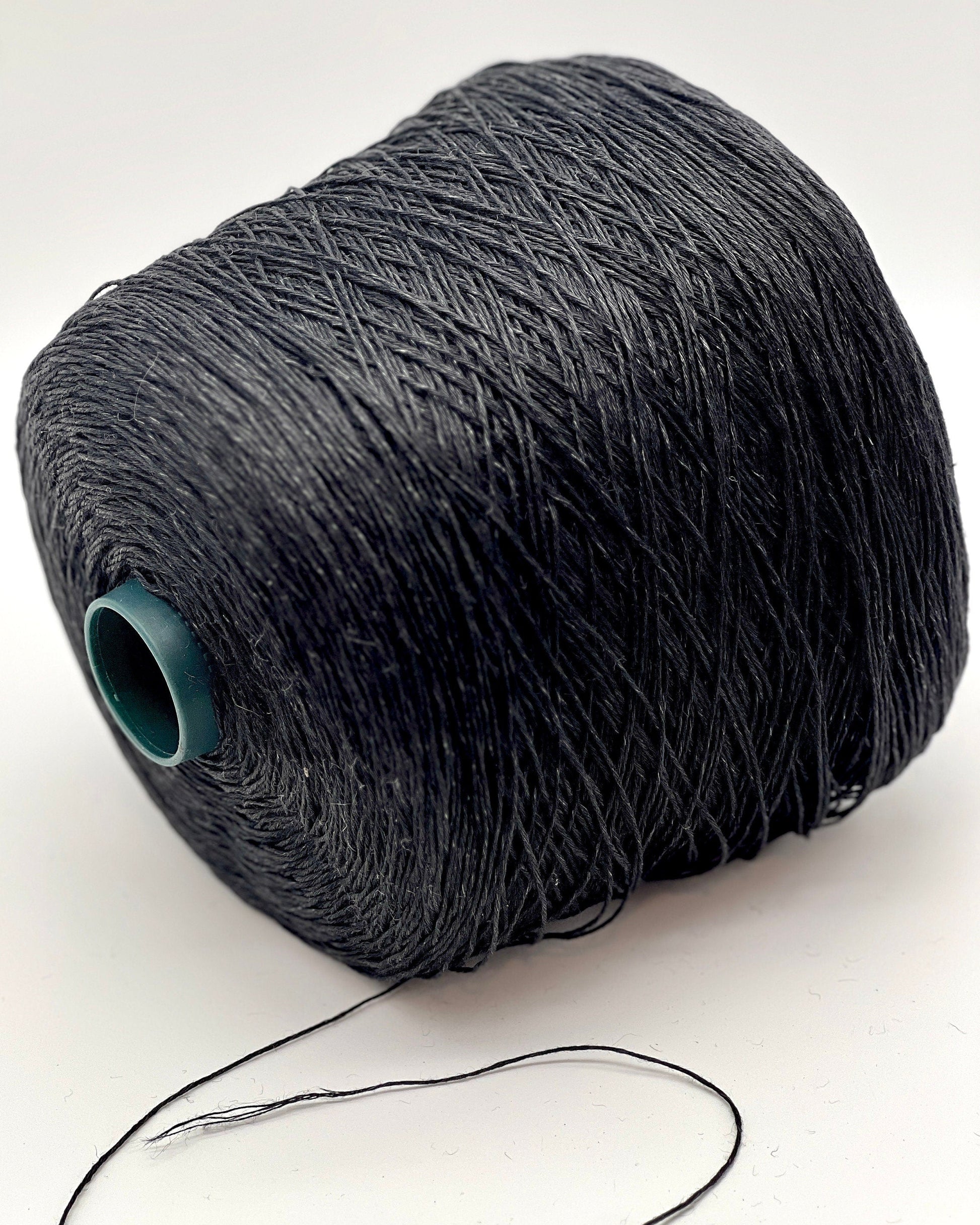 Exclusive iDOKNiT sport weight yarn, LINO by RI.Go Italy. 100% pure linen with an Nm 3200 count, providing 320m per 100g. Authentic Italian-made plant fiber curated by iDOKNiT in classic shades like 954 Black, 955 Beige, and 956 Navy Blue, ideal for durable, breathable summer hand or machine knitting.