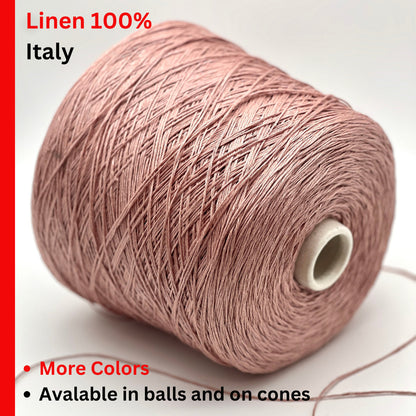 Spool of pink linen thread with text indicating 100% linen from Italy on a white background.