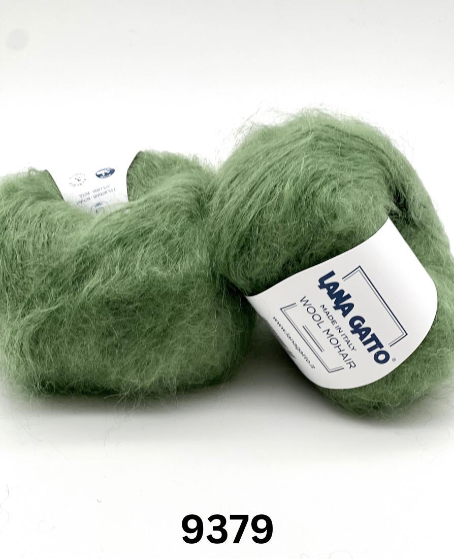 Two green skeins of yarn with a label on a white background