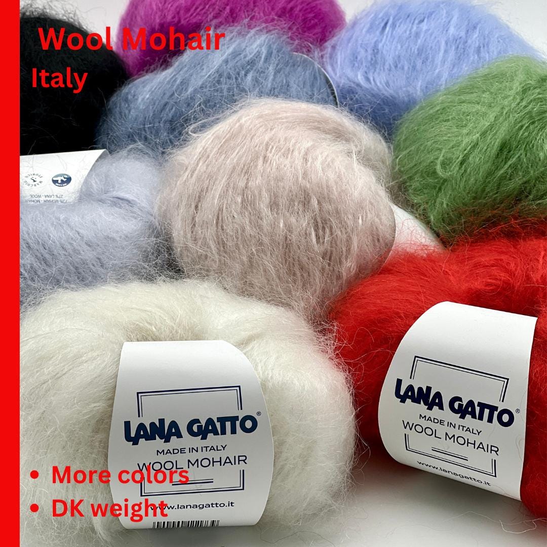 Balls of wool yarn with Lana Gatto labels on a white background