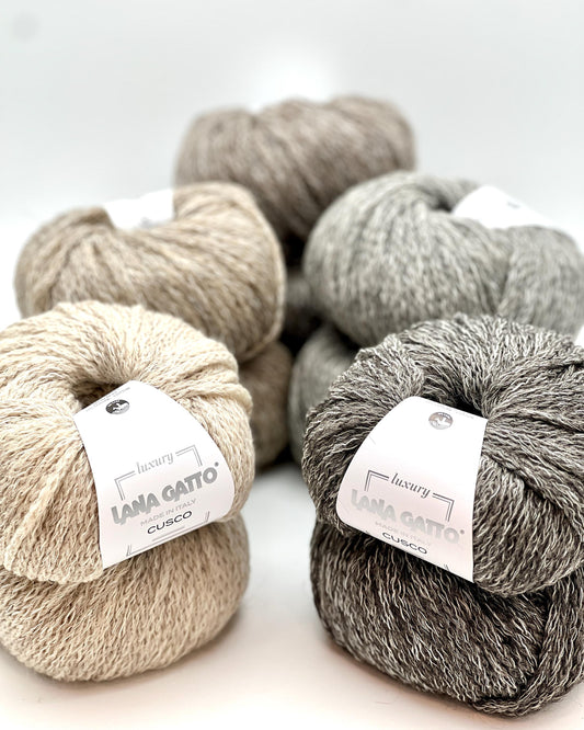 lana gatto cusco chunky chain yarn alpaca wool cotton italy 150m
luxury italian chain yarn lana gatto cusco alpaca wool cotton blend
soft chunky cable yarn for sweaters scarves hats lana gatto cusco
lana gatto cusco marled chain yarn natural beige gray brown tones
alpaca wool cotton chain construction yarn close-up texture italy