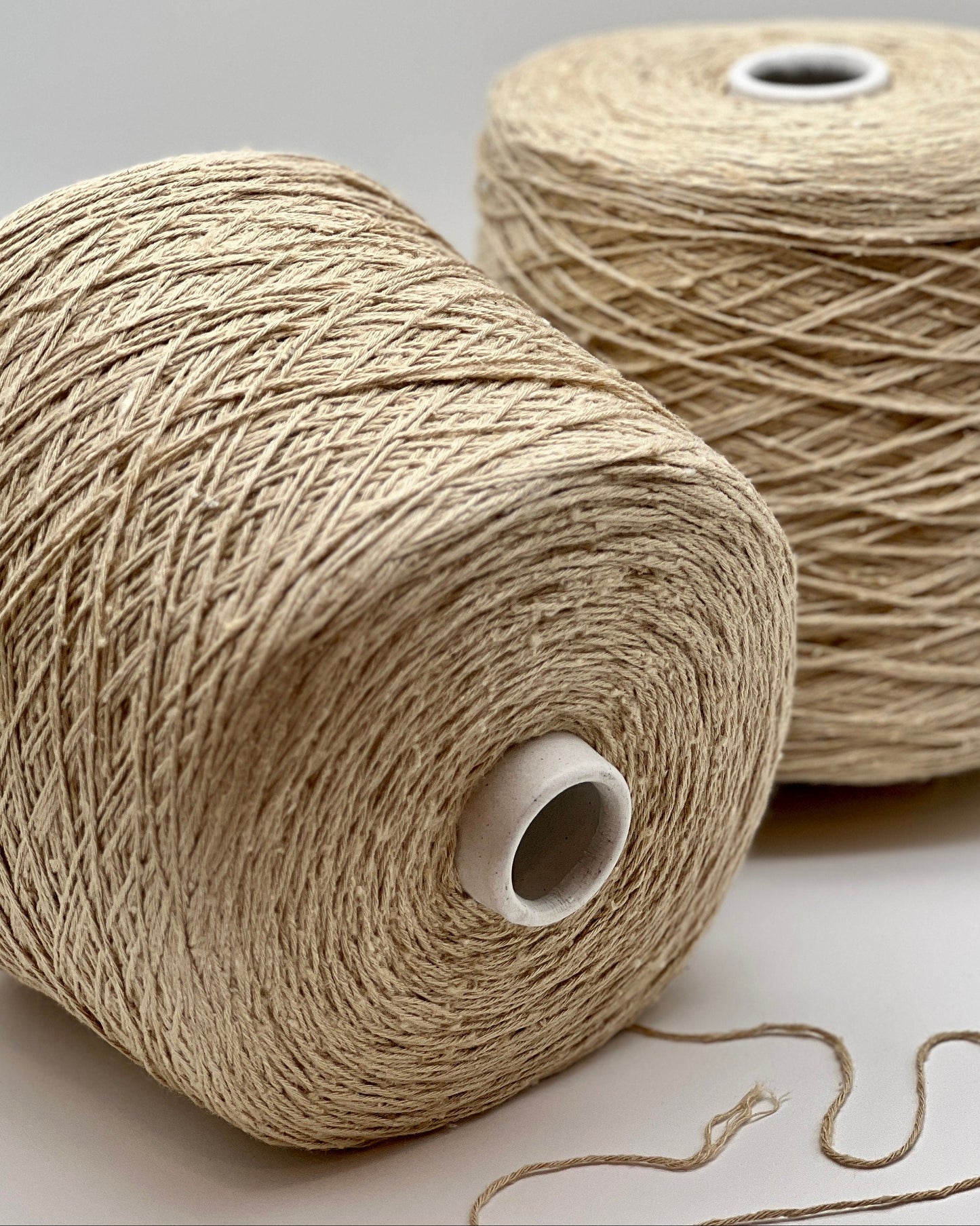 Exclusive iDOKNiT sport weight yarn, SETA TUSSAH by RiGo Italy. 100% pure Tussah silk with a Tit. 3000 count, providing 300m per 100g. Authentic Italian-made luxury fiber featuring a soft, slightly textured matte sheen, curated by iDOKNiT for elegant hand and machine knitting projects.