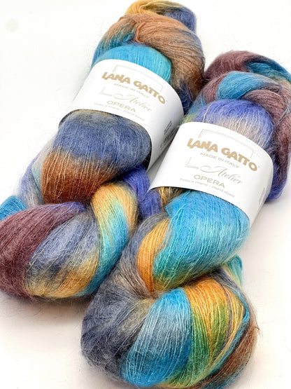 Three skeins of colorful yarn with 'Lana Grossa' labels on a white background