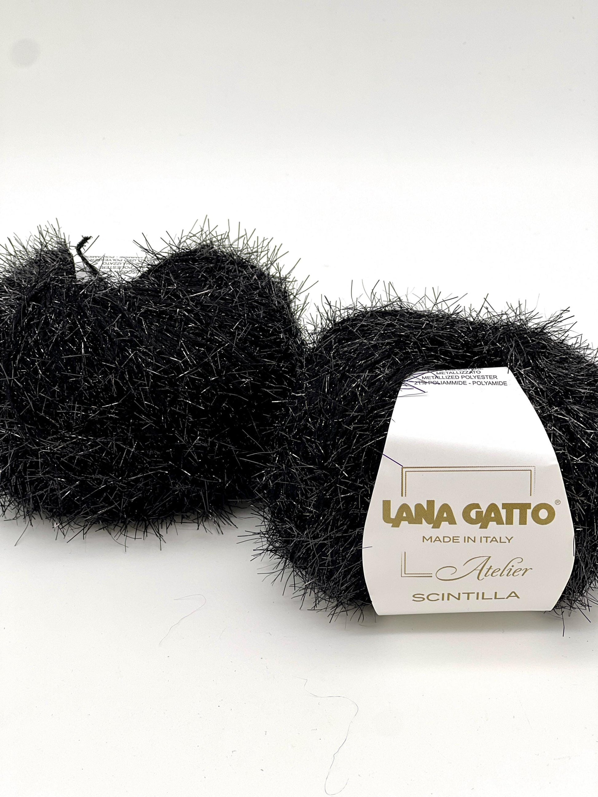 Black yarn skein with 'Lana Gatto' label on a white background