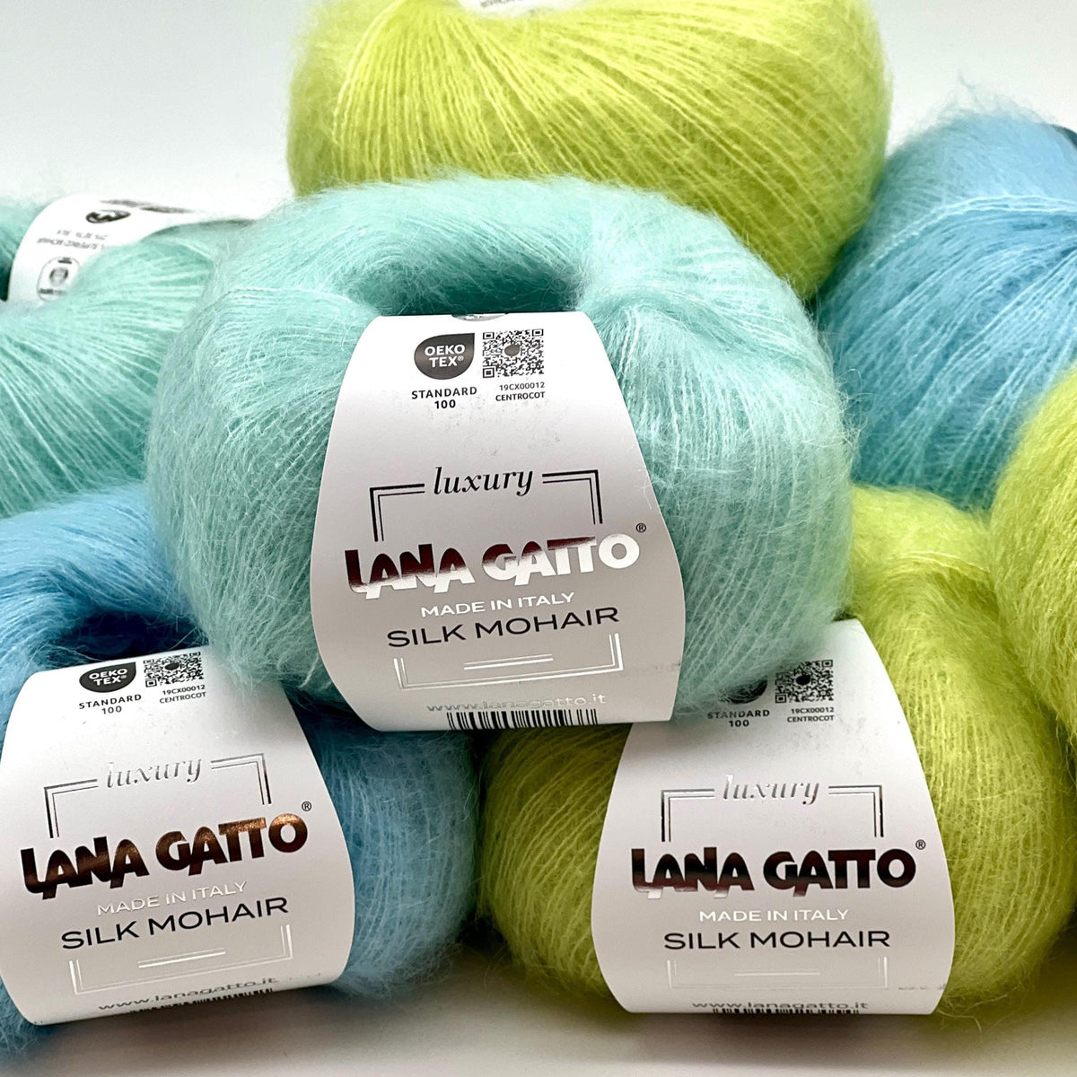 Close-up of iDOKNiT Lana Gatto SILK MOHAIR showing the cloud-like halo of 75% SuperKid Mohair blended with the smooth sheen of 25% Seta Silk in a 25g lace-weight ball.
