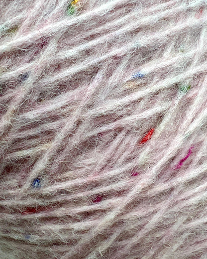 Professional grade Filitaly Lab JOKER DK weight yarn from iDOKNiT, featuring a sophisticated cable yarn construction and a blend of Alpaca and Merino wool. This light and super soft Italian-made yarn is curated by iDOKNiT to provide superior texture and luxury loft for high-performance knitting and crochet projects.