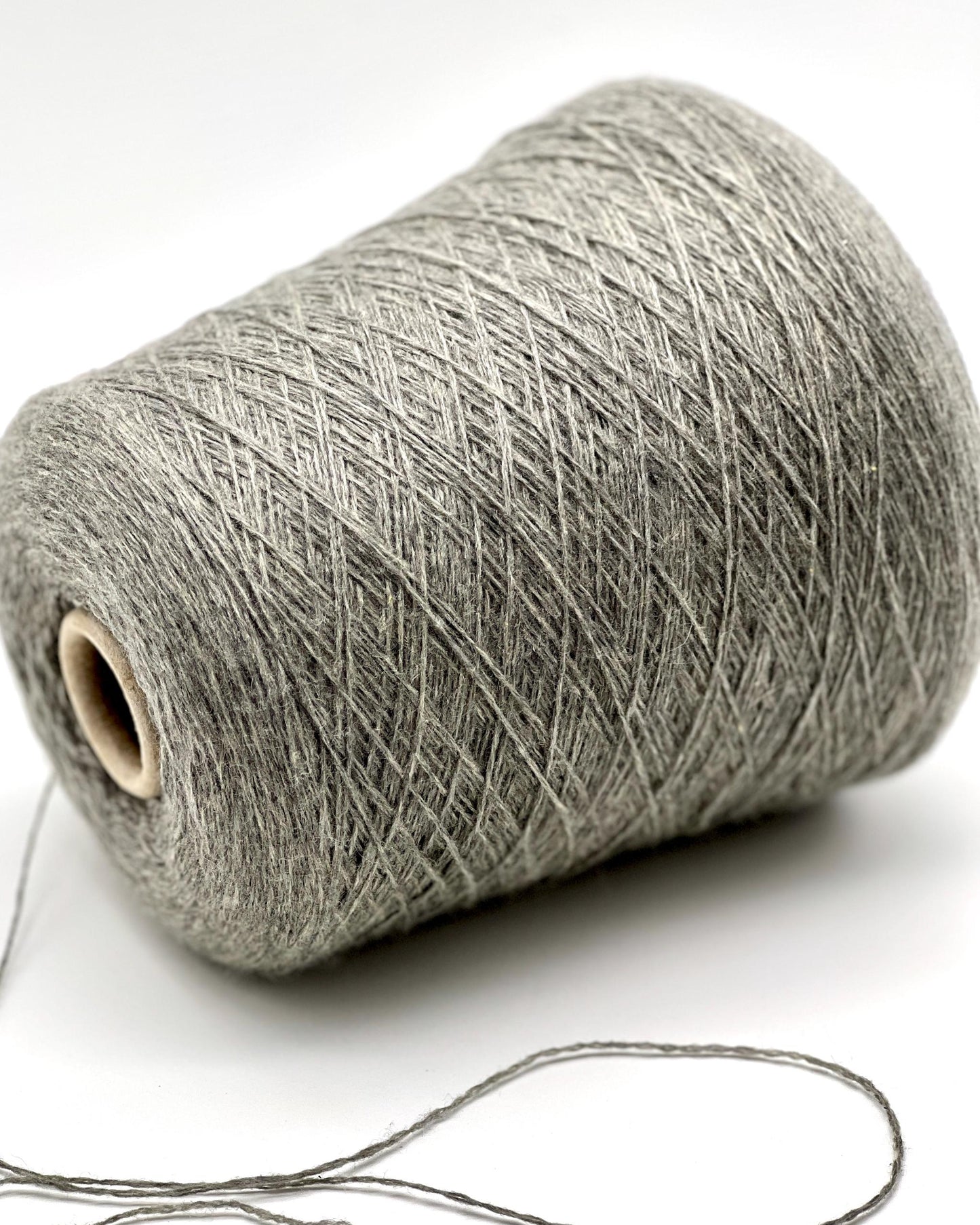 Luxury Italian cashmere yarn CASH LIGHT FINE 850m
100 percent cashmere lace light fingering yarn cone Italy
soft Italian cashmere yarn for sweaters shawls and scarves
premium cashmere yarn close up texture detail
luxury knitting weaving crochet cashmere yarn cone