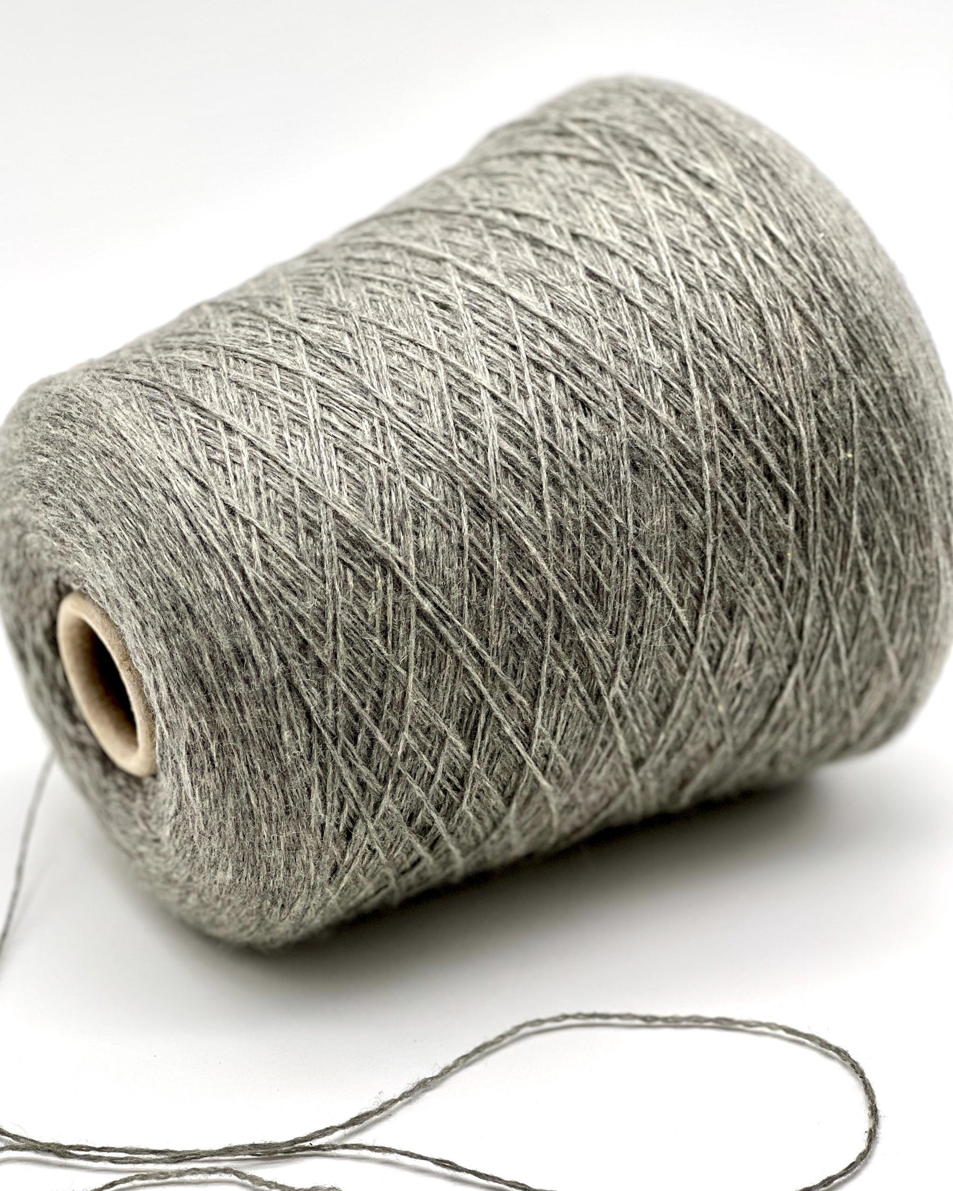 Luxury Italian cashmere yarn CASH LIGHT FINE 850m
100 percent cashmere lace light fingering yarn cone Italy
soft Italian cashmere yarn for sweaters shawls and scarves
premium cashmere yarn close up texture detail
luxury knitting weaving crochet cashmere yarn cone