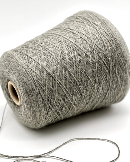 Luxury Italian cashmere yarn CASH LIGHT FINE 850m
100 percent cashmere lace light fingering yarn cone Italy
soft Italian cashmere yarn for sweaters shawls and scarves
premium cashmere yarn close up texture detail
luxury knitting weaving crochet cashmere yarn cone