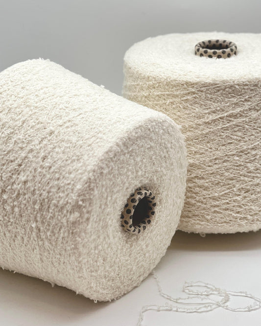 Biagioli Modesto Cashmere Bouclé Italian yarn at iDOKNiT. 86% Cashmere fine weight with soft loop texture. Luxury high-yield fiber for iDOKNiT.com.