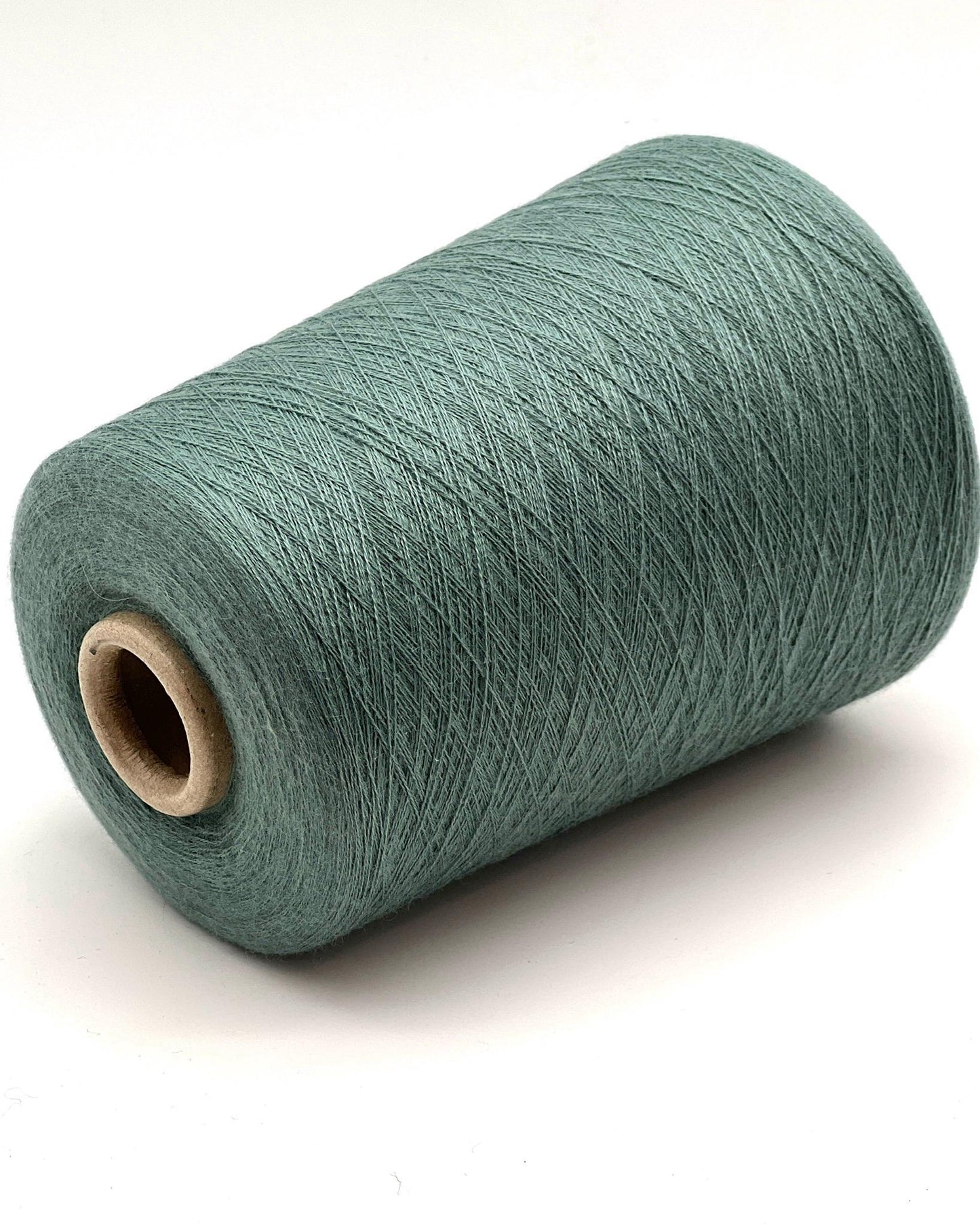 Ultra-fine 100% combed cashmere lace yarn SUPER CASHMERE by Loro Piana on cone, made in Italy. Rare luxury cashmere yarn with exceptional softness, strength, and elegant drape, curated by iDOKNiT for high-end knitting and weaving.