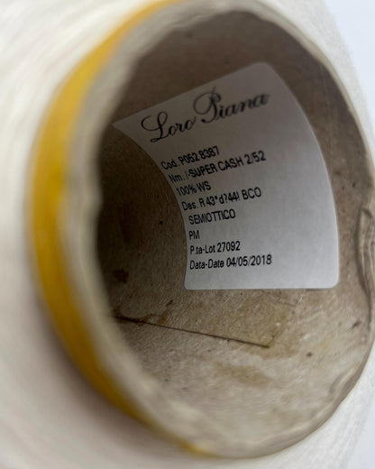 Ultra-fine 100% combed cashmere lace yarn SUPER CASHMERE by Loro Piana on cone, made in Italy. Rare luxury cashmere yarn with exceptional softness, strength, and elegant drape, curated by iDOKNiT for high-end knitting and weaving.