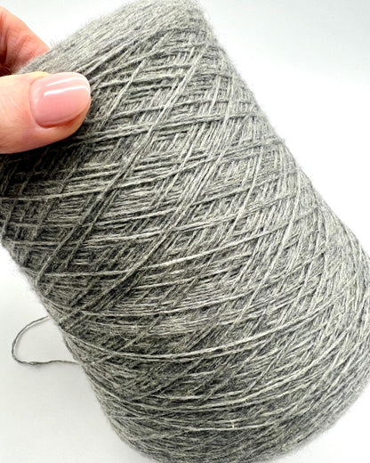 Luxury Italian cashmere yarn CASH LIGHT FINE 850m
100 percent cashmere lace light fingering yarn cone Italy
soft Italian cashmere yarn for sweaters shawls and scarves
premium cashmere yarn close up texture detail
luxury knitting weaving crochet cashmere yarn cone