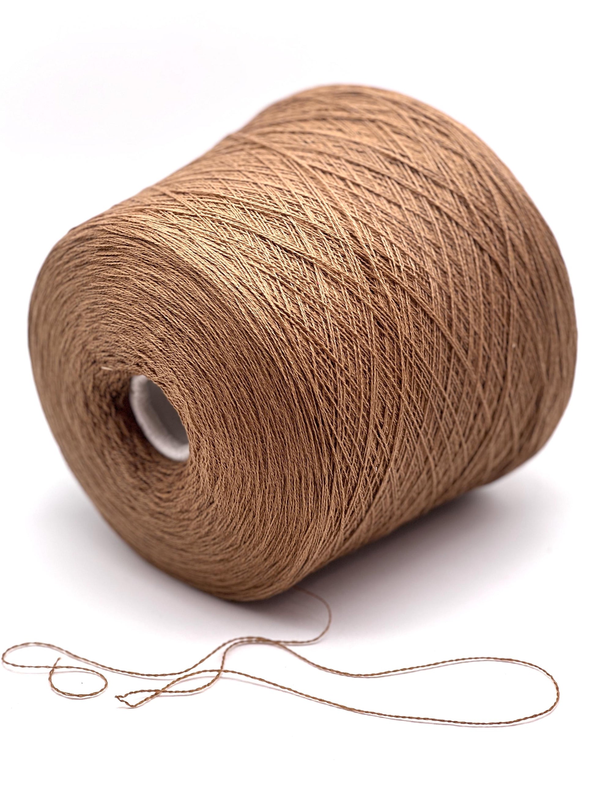 Exclusive iDOKNiT lace weight yarn, VIGOGNA by RiGo Italy. A high-quality blend of 10% cashmere and 90% merino wool in a 2/23 count, providing 1150m per 100g. Curated by iDOKNiT in 1276 Pink and 1277 Camel. Authentic Italian-made luxury fiber for ultra-soft, delicate garments with a refined finish.