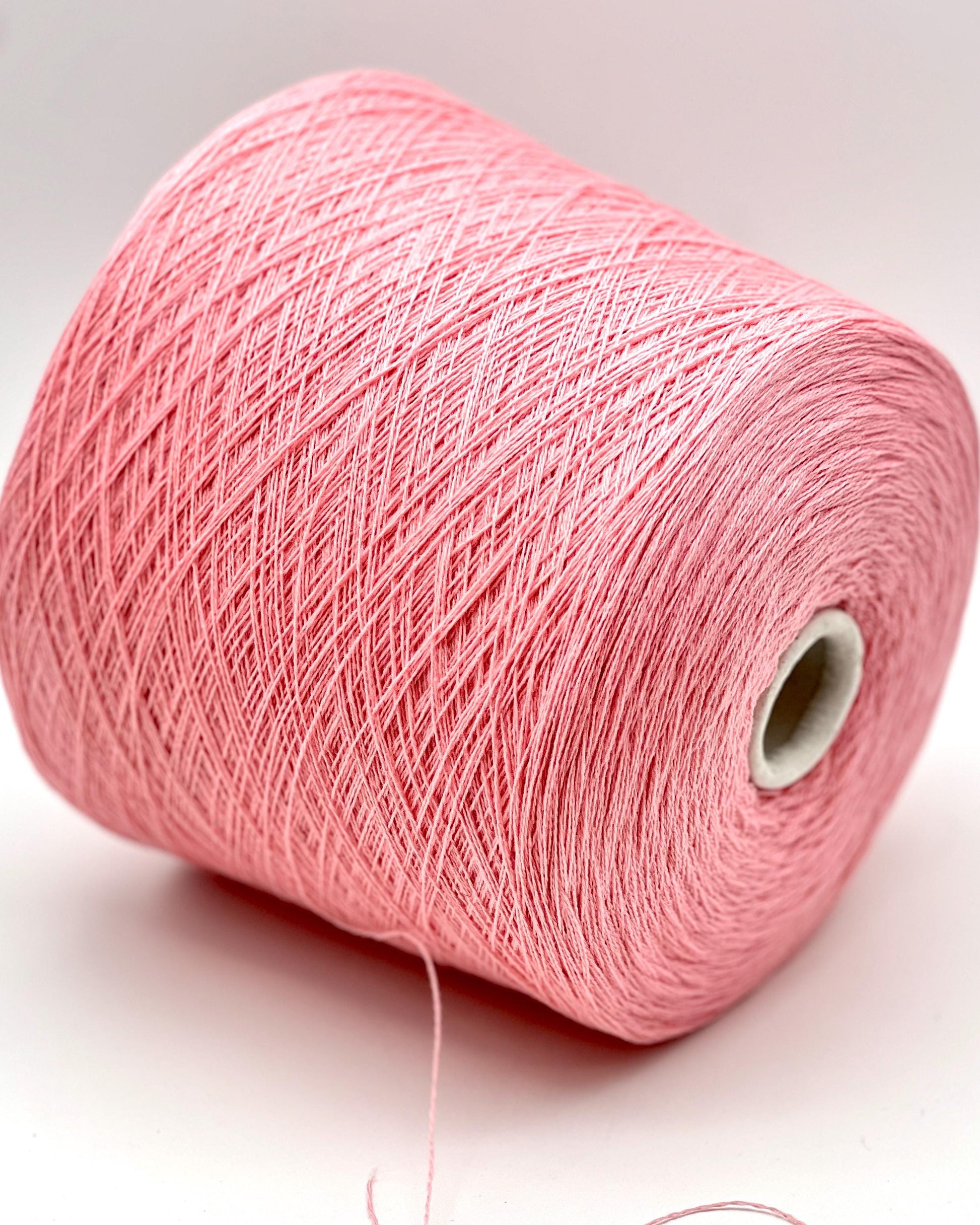 Exclusive iDOKNiT lace weight yarn, VIGOGNA by RiGo Italy. A high-quality blend of 10% cashmere and 90% merino wool in a 2/23 count, providing 1150m per 100g. Curated by iDOKNiT in 1276 Pink and 1277 Camel. Authentic Italian-made luxury fiber for ultra-soft, delicate garments with a refined finish.