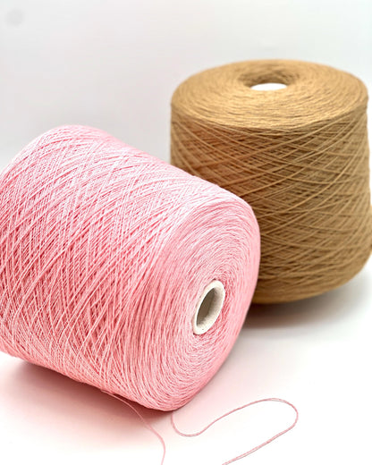 Exclusive iDOKNiT lace weight yarn, VIGOGNA by RiGo Italy. A high-quality blend of 10% cashmere and 90% merino wool in a 2/23 count, providing 1150m per 100g. Curated by iDOKNiT in 1276 Pink and 1277 Camel. Authentic Italian-made luxury fiber for ultra-soft, delicate garments with a refined finish.