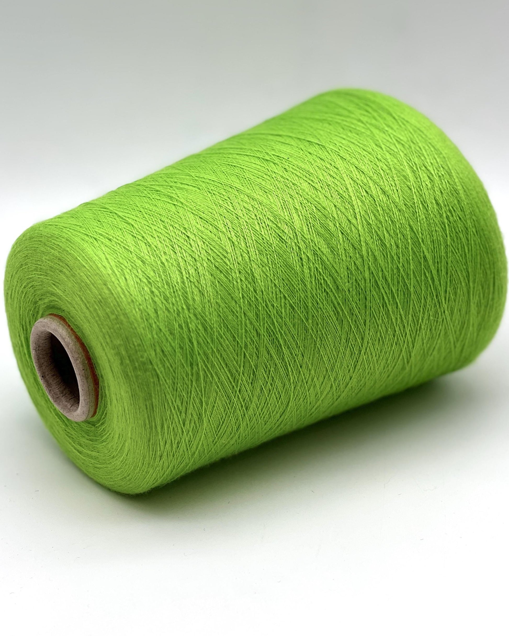 Ultra-fine 100% combed cashmere lace yarn SUPER CASHMERE by Loro Piana on cone, made in Italy. Rare luxury cashmere yarn with exceptional softness, strength, and elegant drape, curated by iDOKNiT for high-end knitting and weaving.