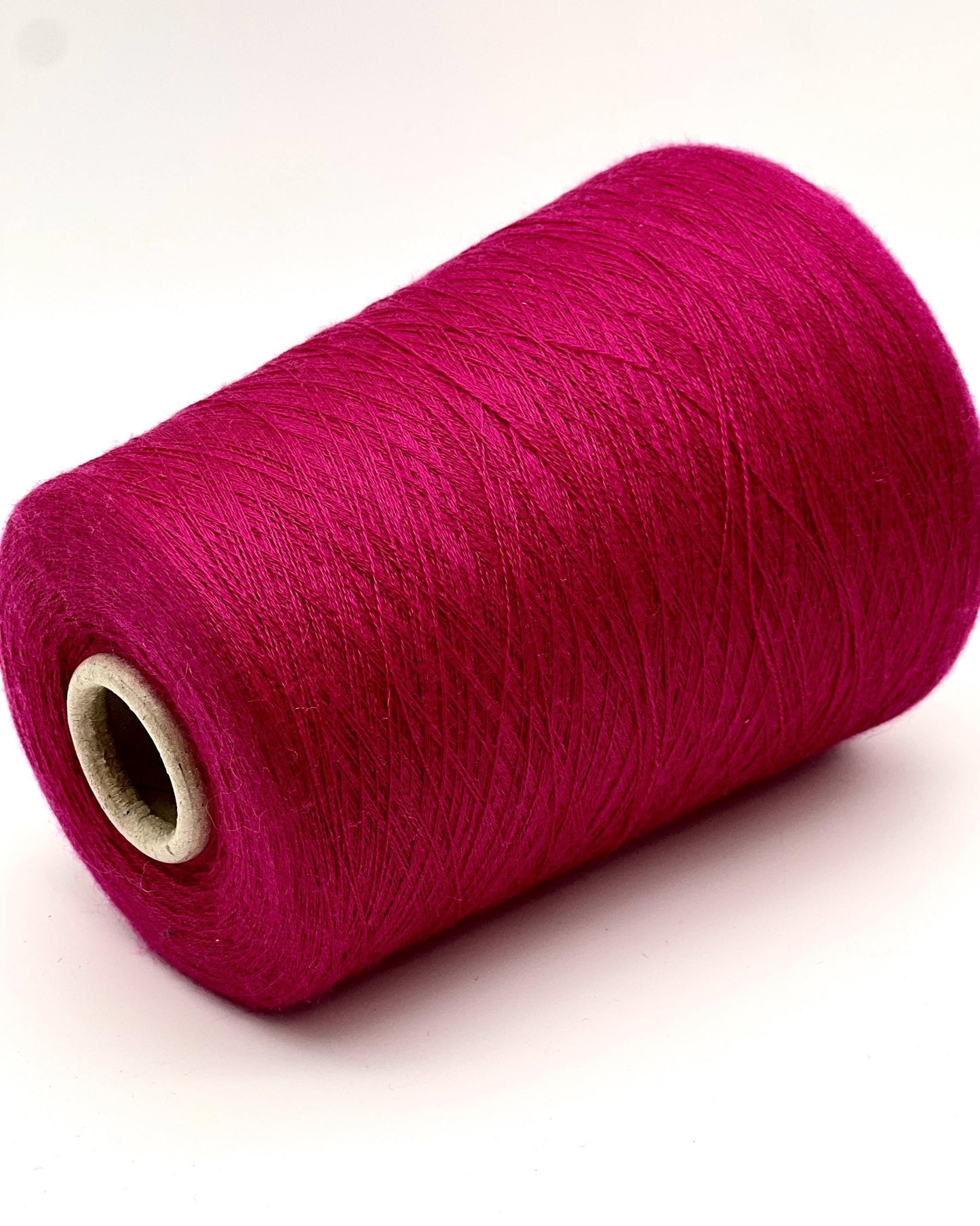 Ultra-fine 100% combed cashmere lace yarn SUPER CASHMERE by Loro Piana on cone, made in Italy. Rare luxury cashmere yarn with exceptional softness, strength, and elegant drape, curated by iDOKNiT for high-end knitting and weaving.