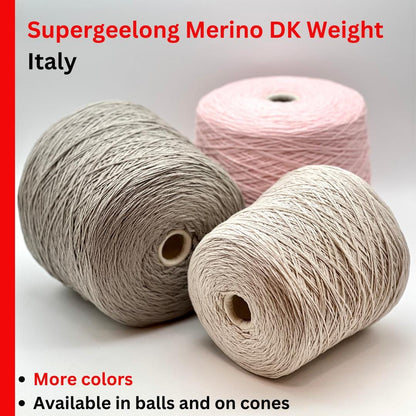 A curated collection of RiGo Supergeelong premium merino wool yarn in a palette of sophisticated neutrals and soft pinks. The image highlights the smooth, even texture and excellent stitch definition of this 100% Italian-made DK/Sport weight fiber. Authentic luxury yarn available at iDOKNiT.com.