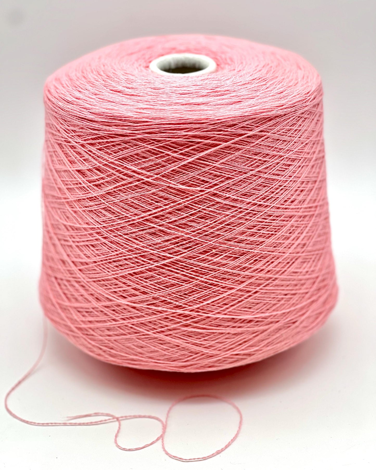 Exclusive iDOKNiT lace weight yarn, VIGOGNA by RiGo Italy. A high-quality blend of 10% cashmere and 90% merino wool in a 2/23 count, providing 1150m per 100g. Curated by iDOKNiT in 1276 Pink and 1277 Camel. Authentic Italian-made luxury fiber for ultra-soft, delicate garments with a refined finish.