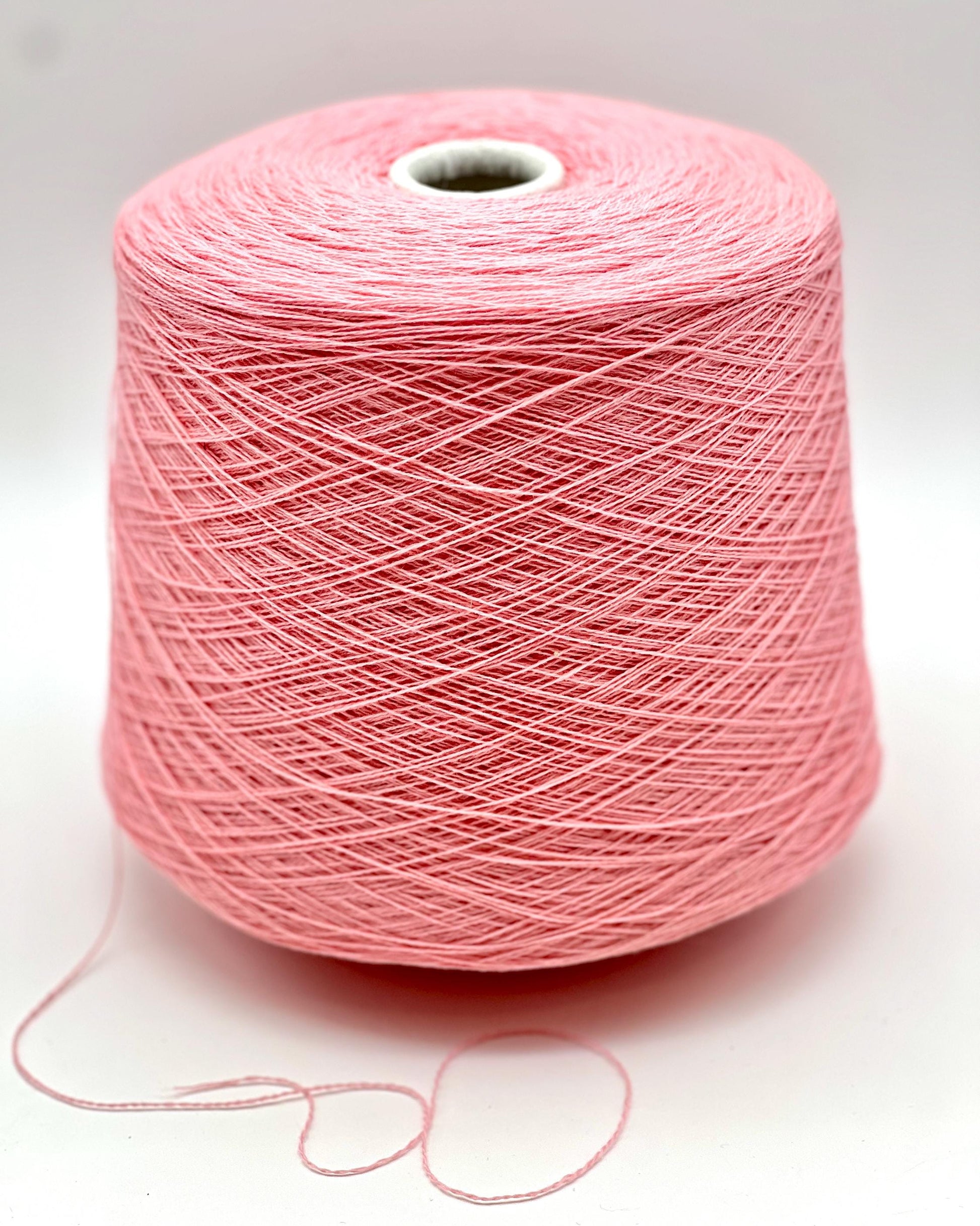 Exclusive iDOKNiT lace weight yarn, VIGOGNA by RiGo Italy. A high-quality blend of 10% cashmere and 90% merino wool in a 2/23 count, providing 1150m per 100g. Curated by iDOKNiT in 1276 Pink and 1277 Camel. Authentic Italian-made luxury fiber for ultra-soft, delicate garments with a refined finish.