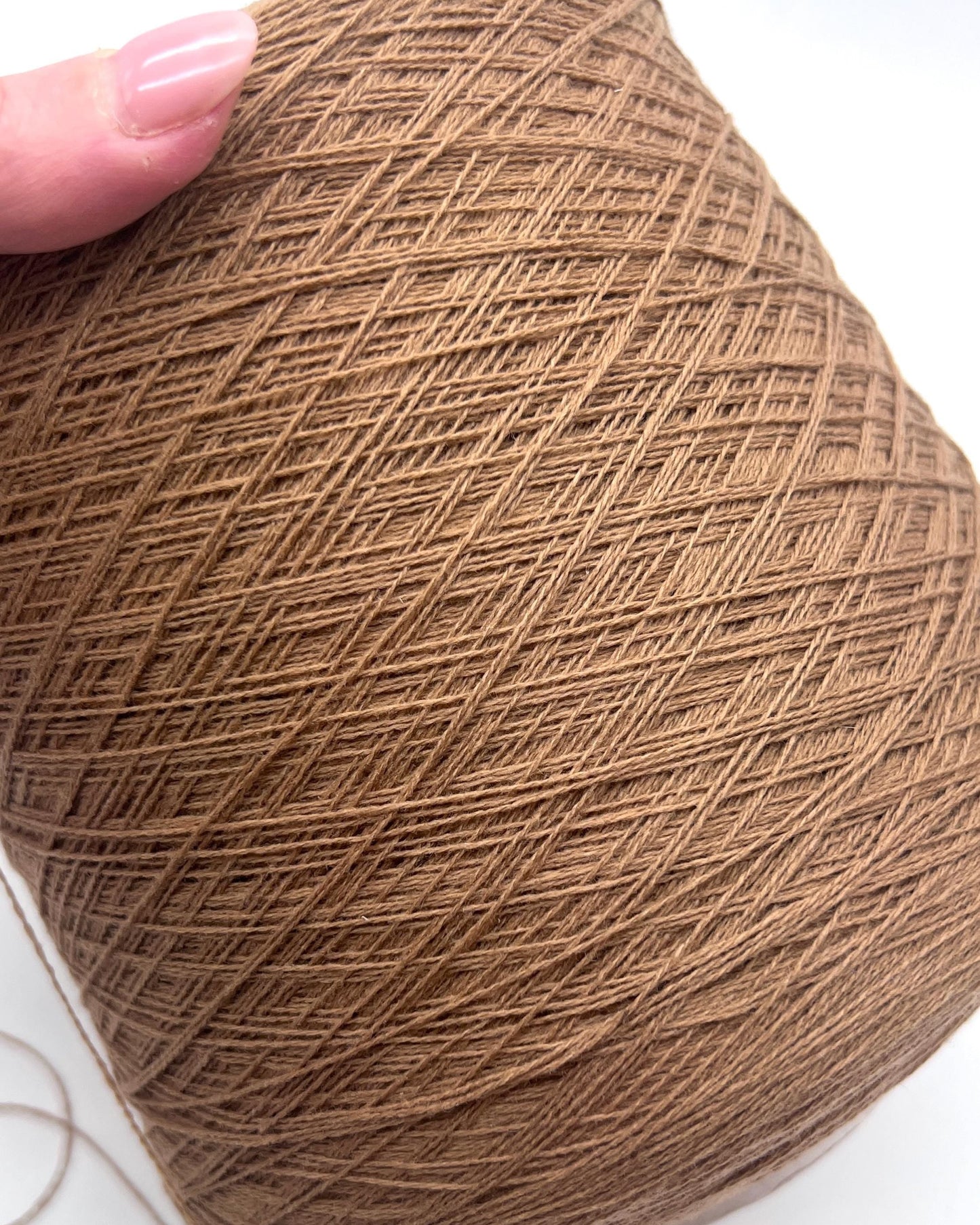 Exclusive iDOKNiT lace weight yarn, VIGOGNA by RiGo Italy. A high-quality blend of 10% cashmere and 90% merino wool in a 2/23 count, providing 1150m per 100g. Curated by iDOKNiT in 1276 Pink and 1277 Camel. Authentic Italian-made luxury fiber for ultra-soft, delicate garments with a refined finish.