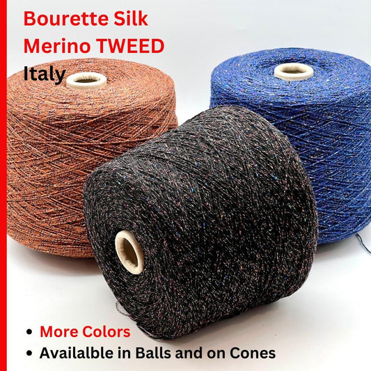 Three spools of Bourette Silk Merino Tweed yarn in brown, black, and blue on a white background.