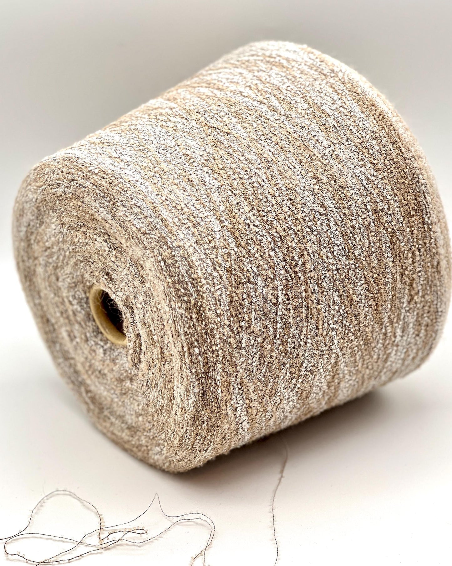 Elite iDOKNiT luxury micro-bouclé yarn, BABY15 by Polipeli Italy. 79% baby alpaca lace weight, Nm 14500. Authentic Italian-made fine airy loop yarn curated by iDOKNiT for professional knitting.