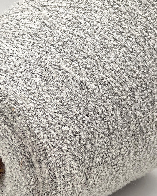 Elite iDOKNiT luxury micro-bouclé yarn, BABY15 by Polipeli Italy. 79% baby alpaca lace weight, Nm 14500. Authentic Italian-made fine airy loop yarn curated by iDOKNiT for professional knitting.