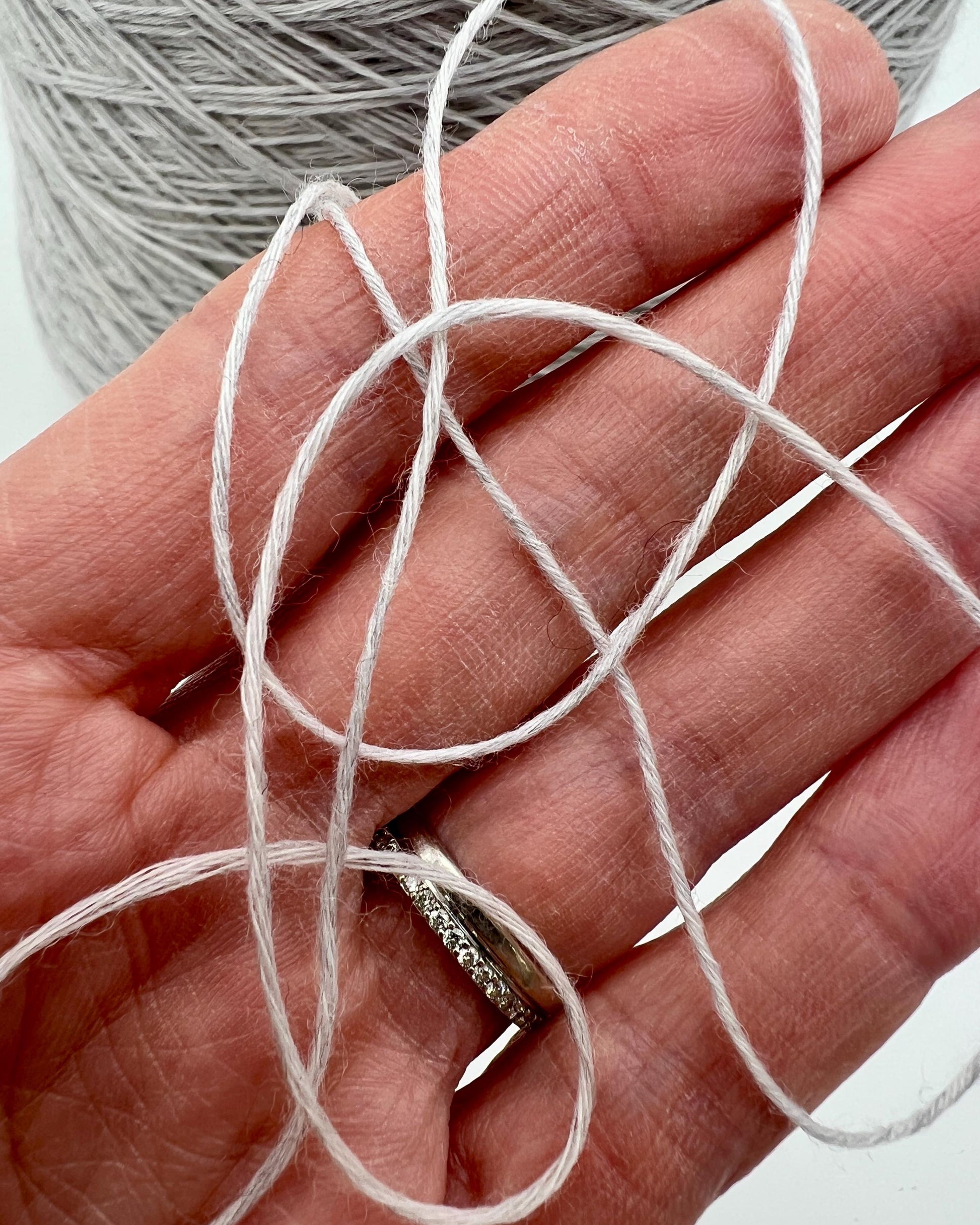 Elite iDOKNiT luxury lace yarn, MERINOS 6000 by RiGo Italy. 100% super soft merino wool, Nm 6000. Authentic Italian-made fine wool yarn with natural elasticity and breathability curated by iDOKNiT for professional knitting.